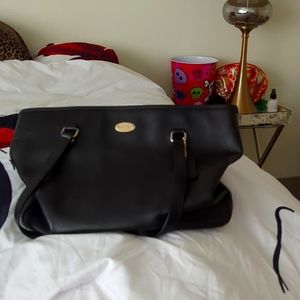 Black coach purse used but in decent condition